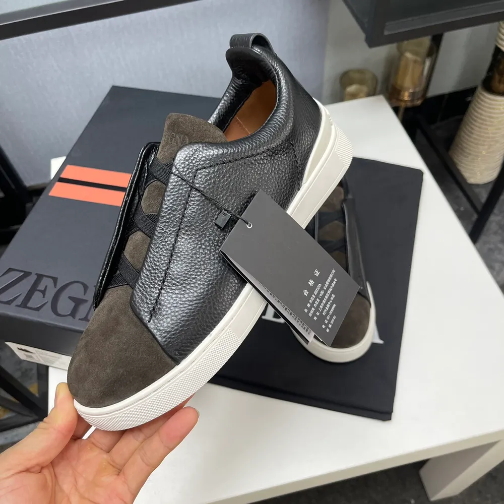 p670 ERMENEGILDO ZEGNA 傑尼亞男鞋 COUTURE Triple Stitch 運動鞋限量款 Triple Stitch 是一款精緻的休閒鞋履,飾有標誌性三重交叉鬆緊細節,靈感源於三重手縫線跡造型,彰顯了傑尼亞的悠久傳